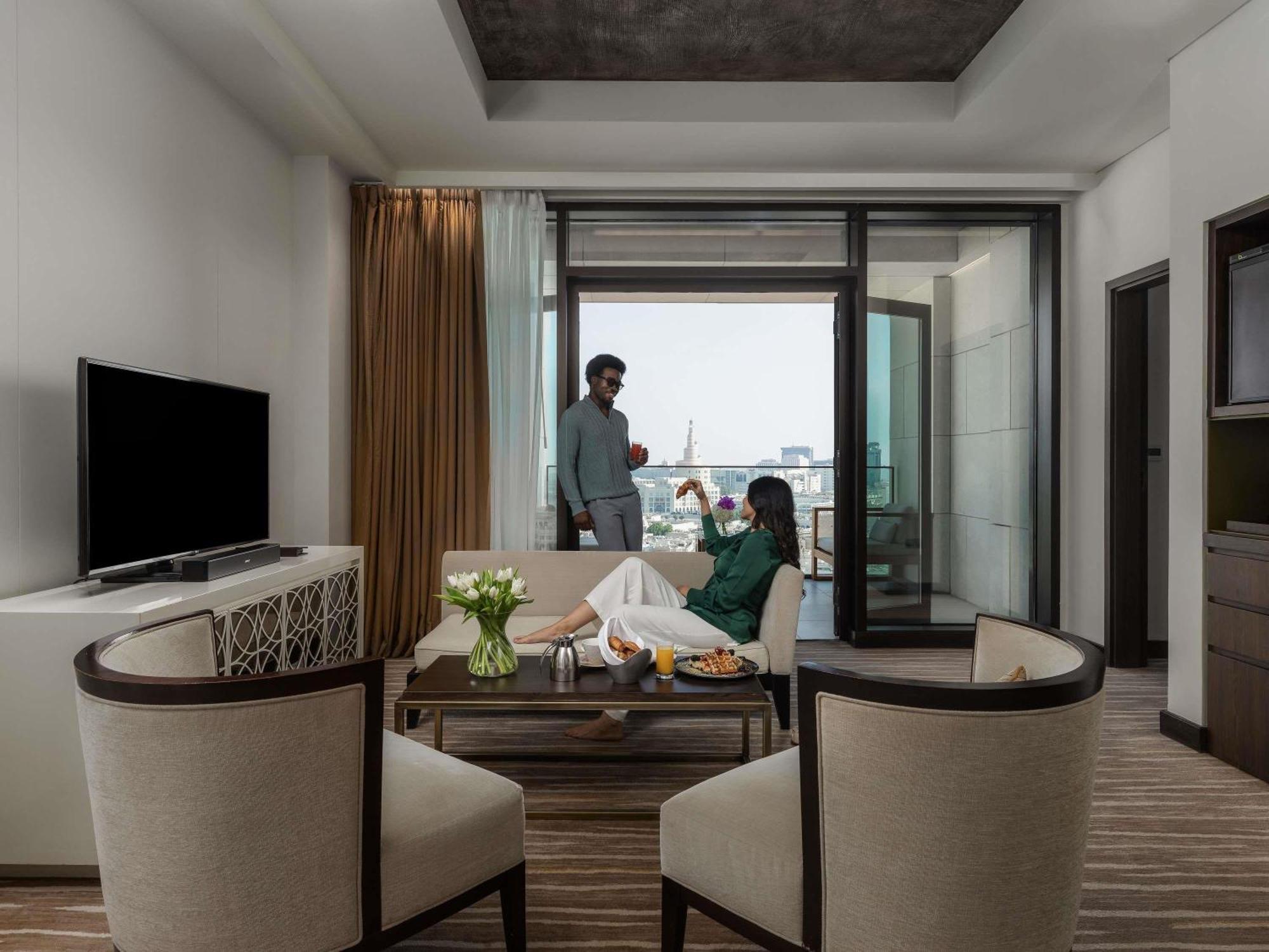 Suite mit 1 Schlafzimmer mit Kingsize-Bett, Terrasse und Wohnbereich